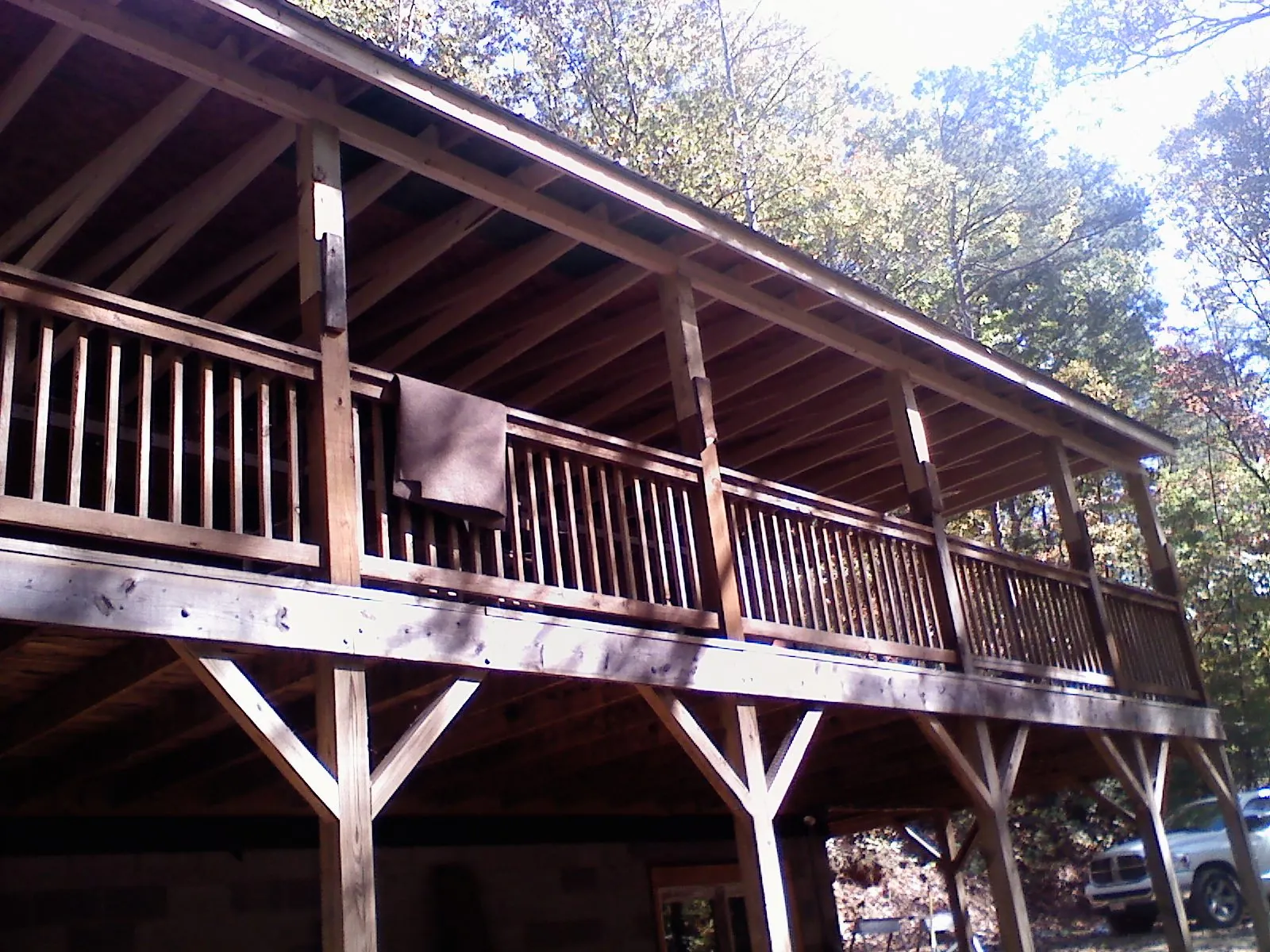 Timber framing under a new elevated porch and deck — Roof Leak Repair in Stoddard by Roofing Brothers